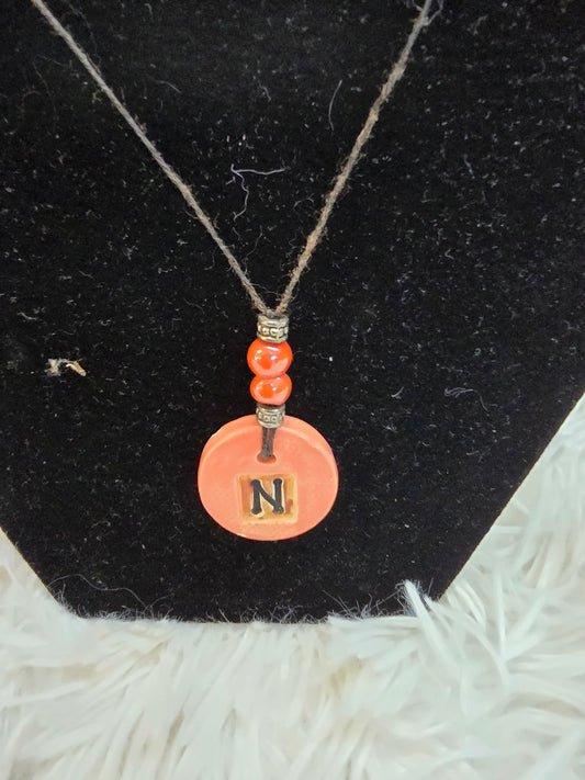 Orange color Wax and a stone engraved necklace image 1