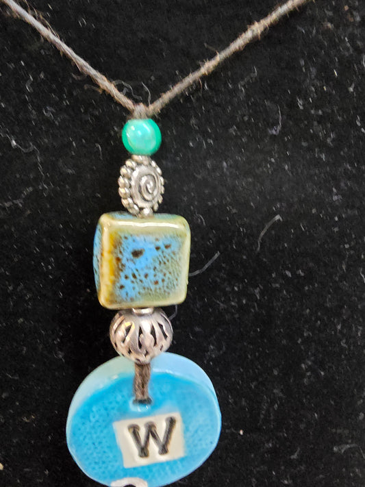 Stone and wax necklace image 1