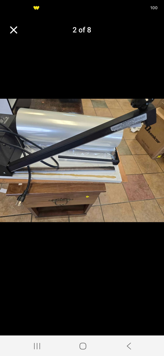 commercial impulse heat sealer includes a heat gun for versatile bag sealing applications