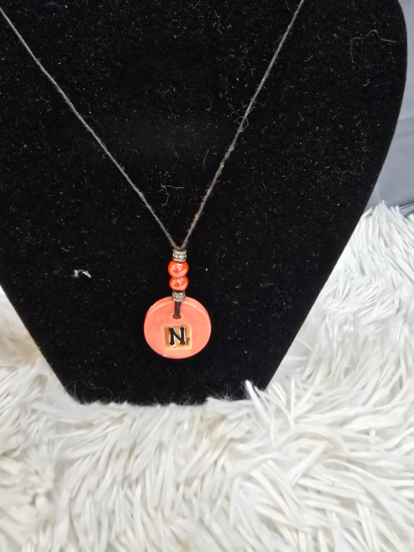 Orange color Wax and a stone engraved necklace  image 0