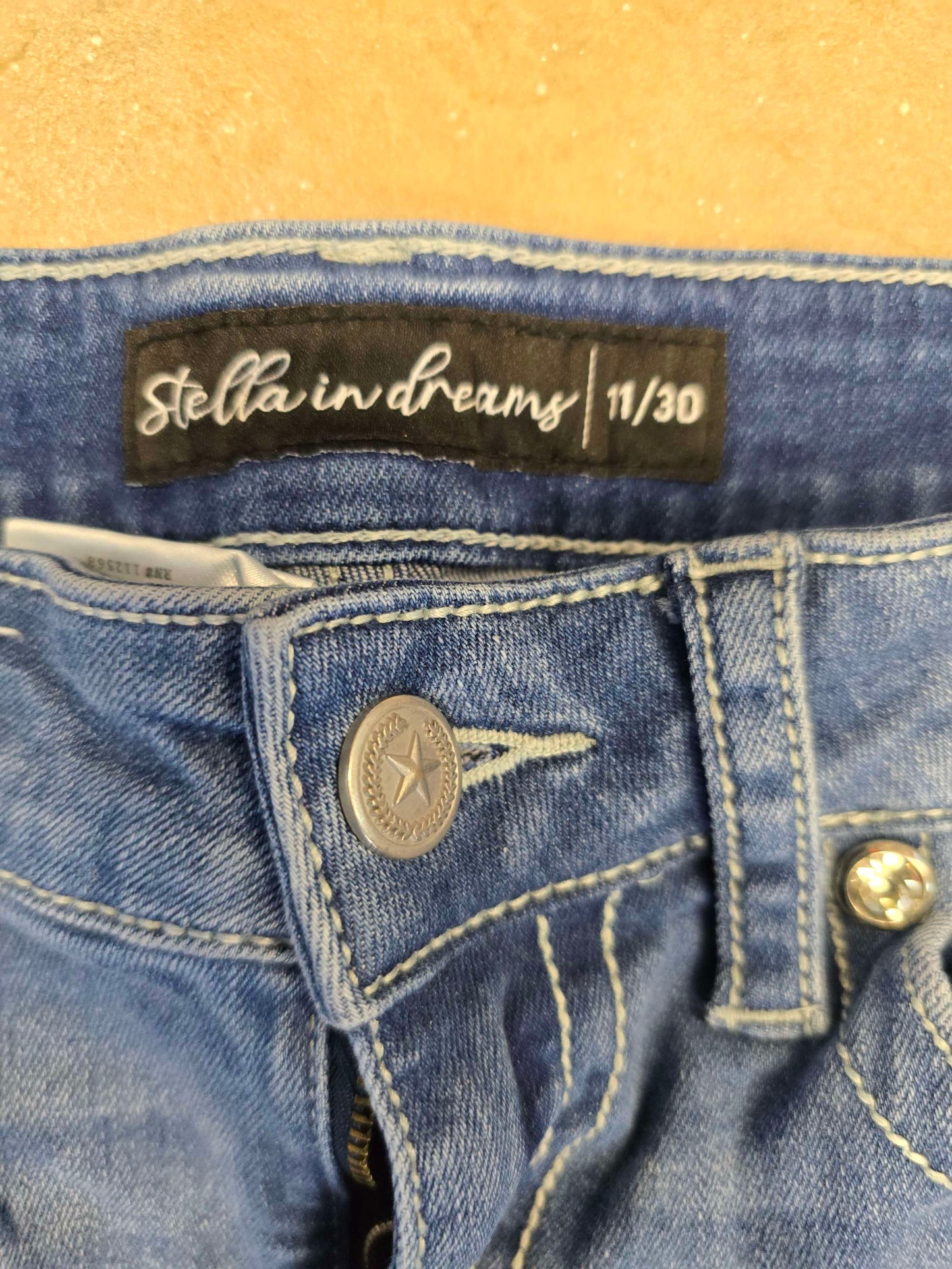 Girls Blue jeans size 11 image 3