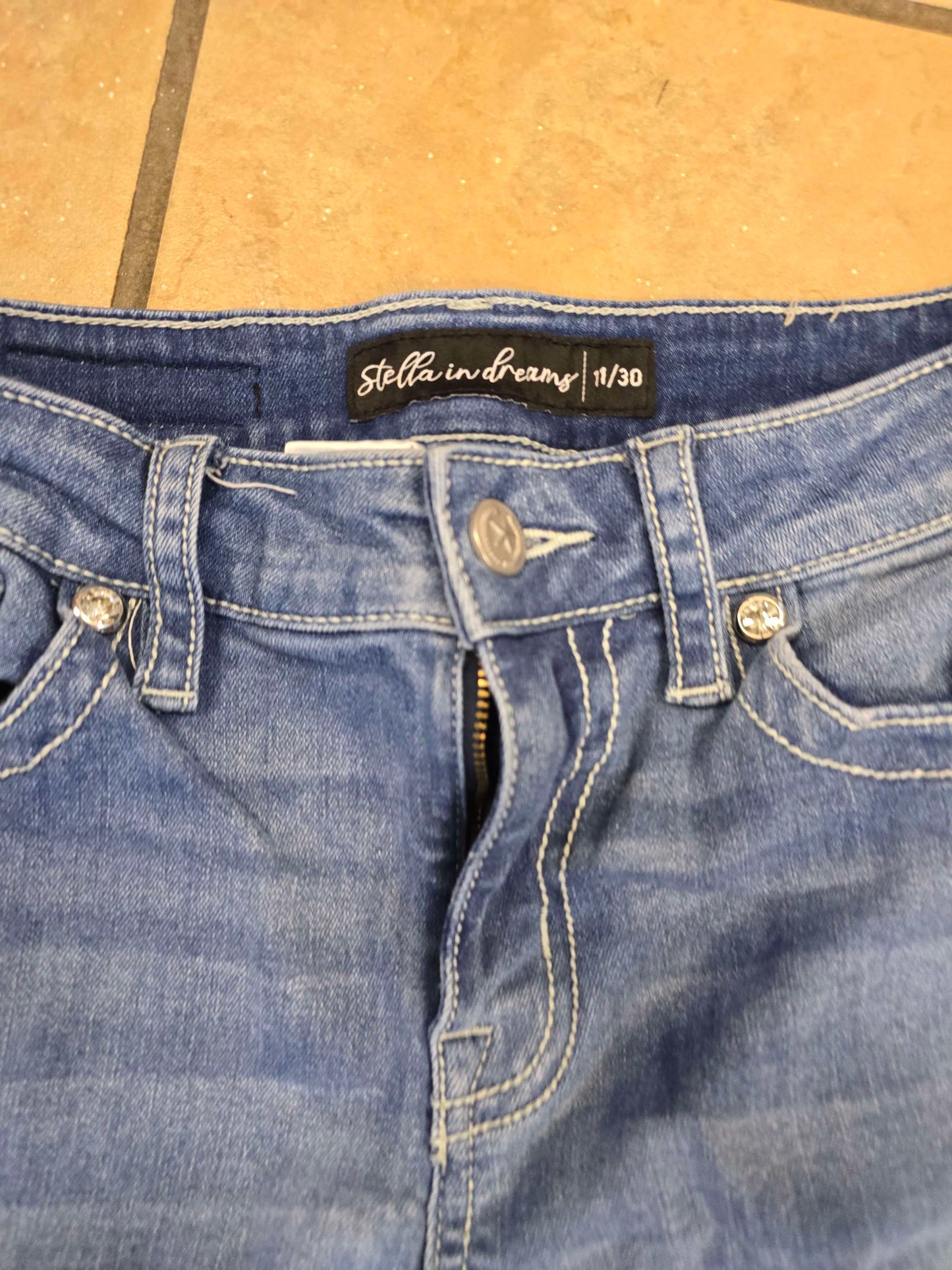 Girls Blue jeans size 11 image 2