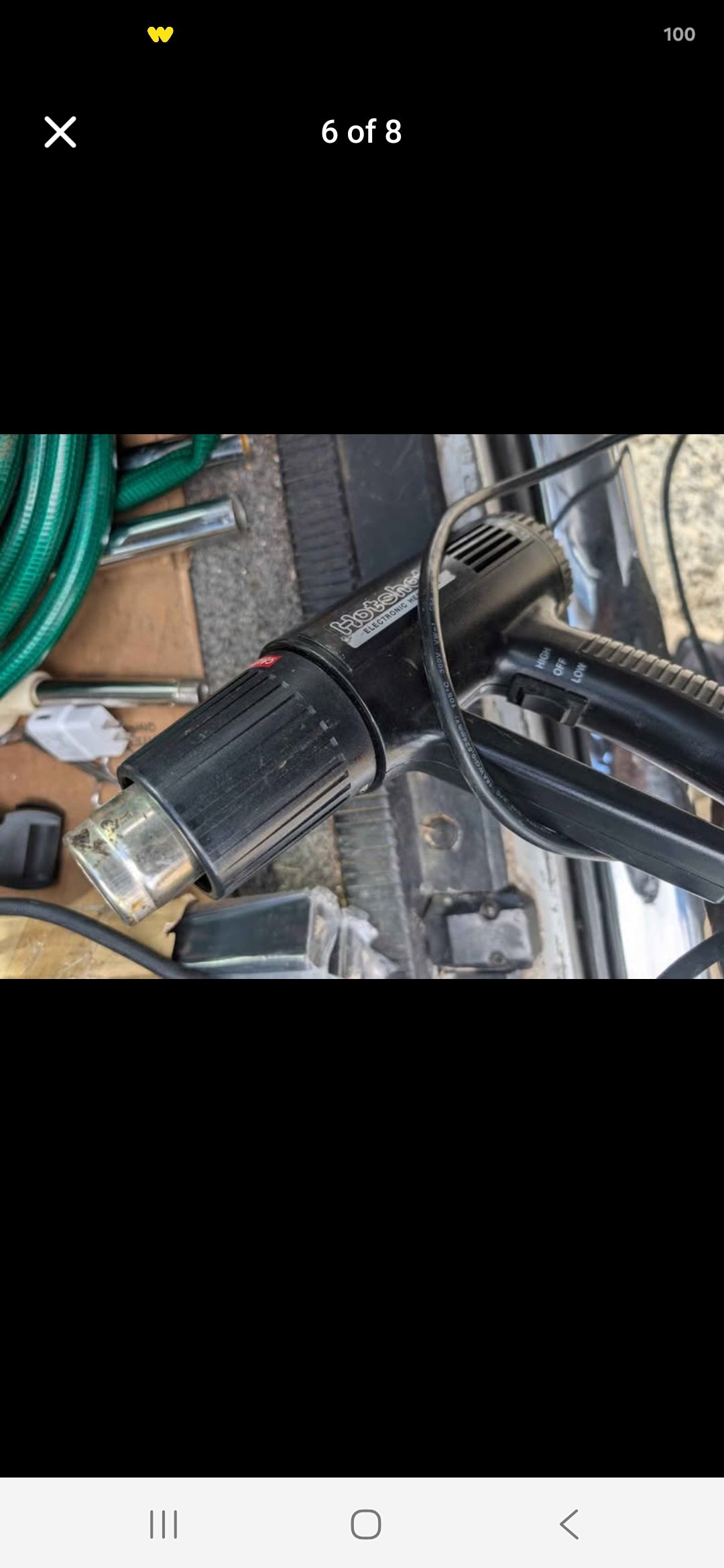 commercial impulse heat sealer includes a heat gun for versatile bag sealing applications