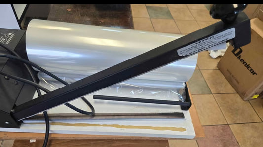 commercial impulse heat sealer includes a heat gun for versatile bag sealing applications