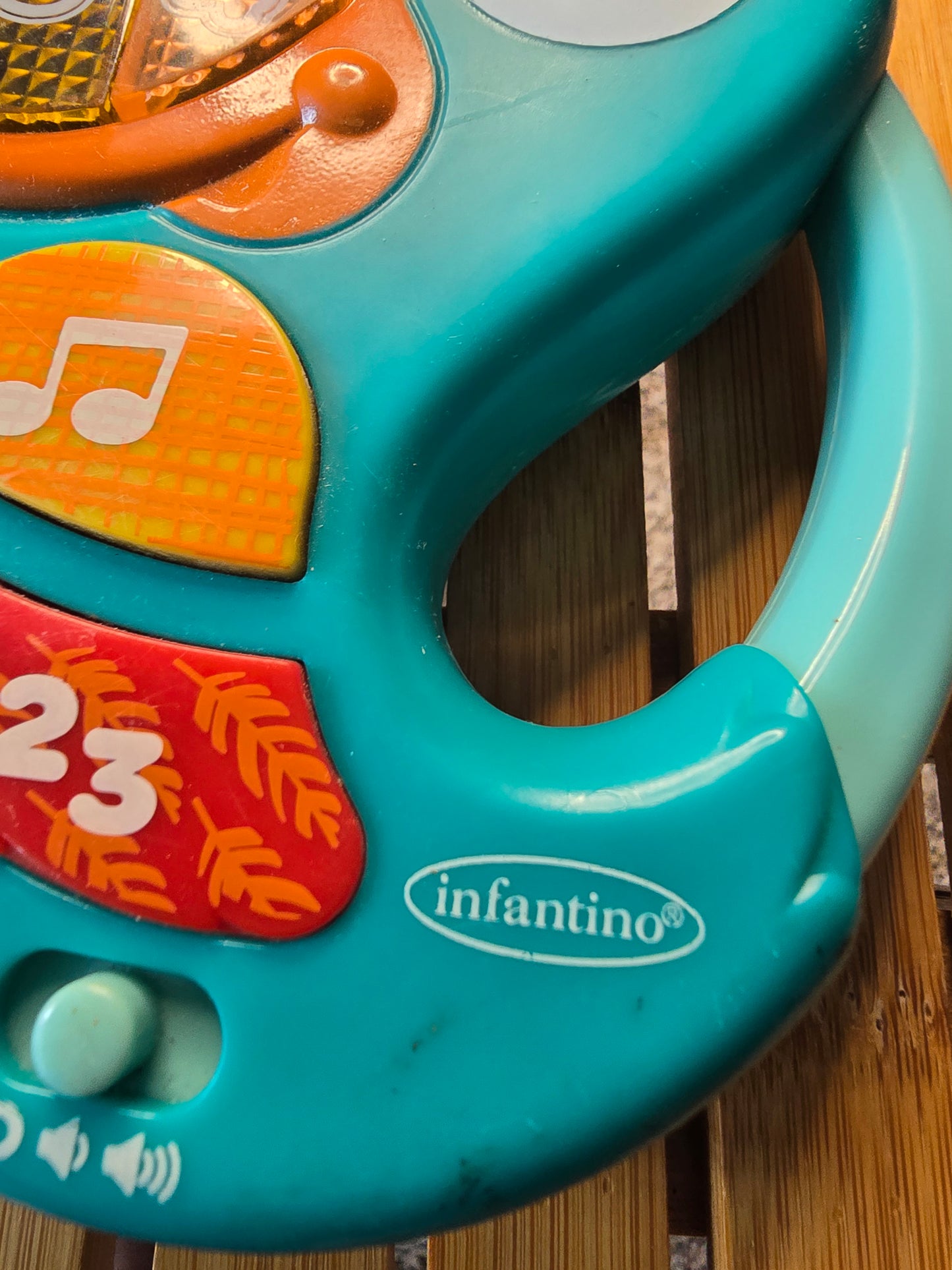 Infantino Musical Fish Baby Activity Toy – Lights, Sounds & Piano Keys – Teal Orange